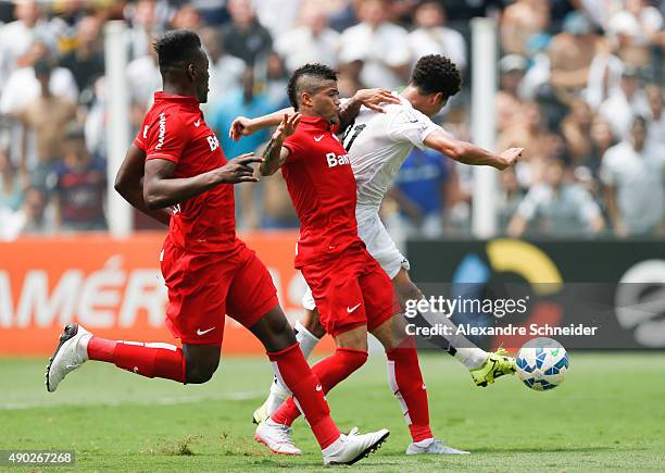 Victor Ferraz of Santos scores their first goal during the match between Santos and Internacional for the Brazilian Series A 2015 at Vila Belmiro...