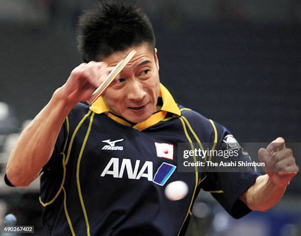 Kaii Yoshida of Japan competes in his match in the Men's Team second stage match between Japan and Chinese Taipei during day six of the 2008 World...
