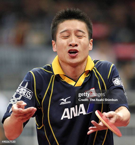Kaii Yoshida of Japan comptes in his match in the Men's Team semi-final between Japan and South Korea during day seven of the 2008 World Team Table...