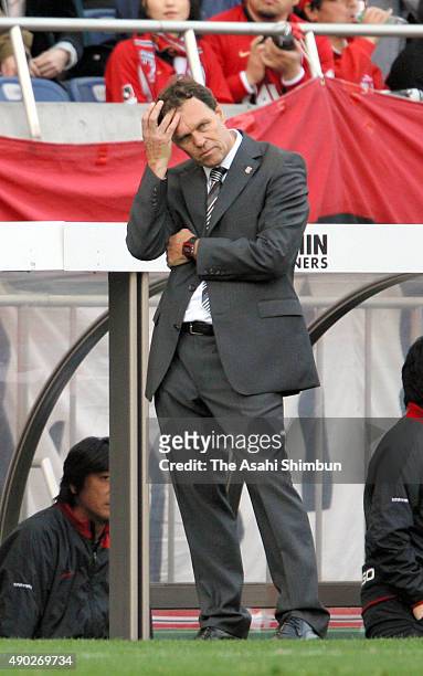 Urawa Red Diamonds head coach Holger Osieck looks on during the J.league match between Urawa Red Diamonds and Nagoya Grampus at Saitama Stadium on...