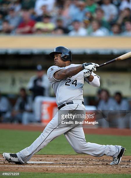 Dayan Viciedo of the Chicago White Sox bats against the Oakland Athletics during the game at O.co Coliseum on Tuesday, May 13, 2014 in Oakland,...