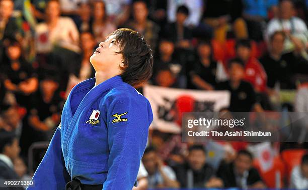 Chizuru Arai of Japan reacts after her defeat by Ippon in the Women's -70kg bronze medal match against Fanny Estelle Posvite of France during the...