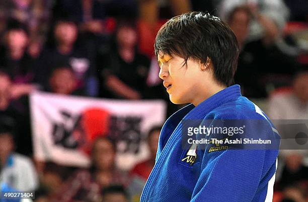 Chizuru Arai of Japan reacts after her defeat by Ippon in the Women's -70kg bronze medal match against Fanny Estelle Posvite of France during the...