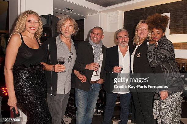 Mounia Briya, guest, Philippe Etchebest, Didier Coly, Luana Belmondo and guest attend 'Fromage Fashion Week Menu' on September 27, 2015 in Paris,...