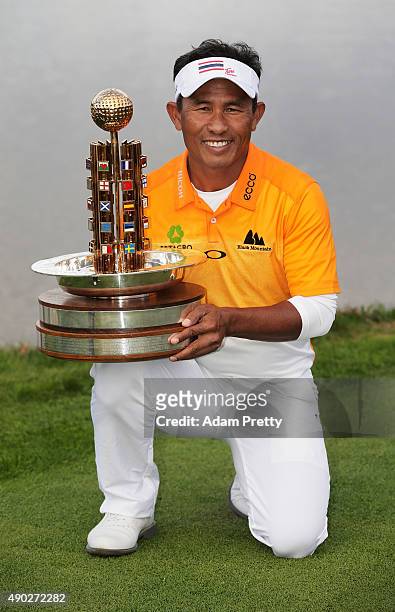 Thongchai Jaidee of Thailand poses with the winners trophy after victory in the final round of the Porsche European Open at Golf Resort Bad Griesbach...