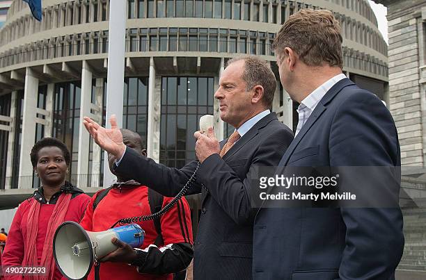 David Shearer Labour Spokes person for Foreign Affairs with Labour party leader David Cunliffe , speak to the crowds as they protest against the...