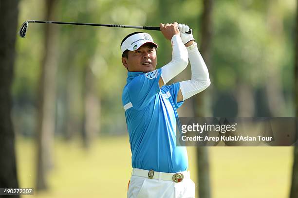 Lin Wen Tang of Chinese Taipei plays a shot during practice ahead of the ICTSI Philippine Open at Wack Wack Golf and Country Club on May 14, 2014 in...