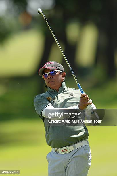 Prayad Marksaeng of Thailand plays a shot during practice ahead of the ICTSI Philippine Open at Wack Wack Golf and Country Club on May 14, 2014 in...