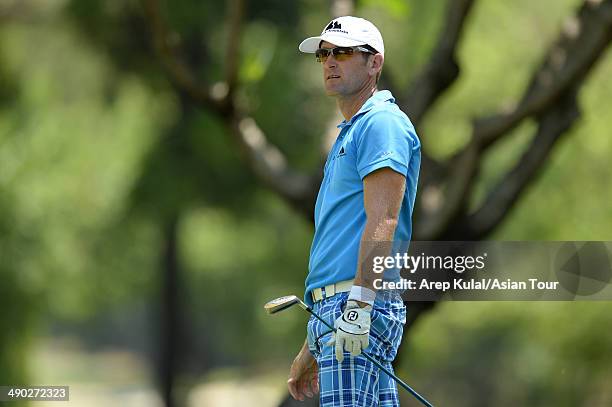 Berry Henson of USA plays a shot during practice ahead of the ICTSI Philippine Open at Wack Wack Golf and Country Club on May 14, 2014 in Manila,...