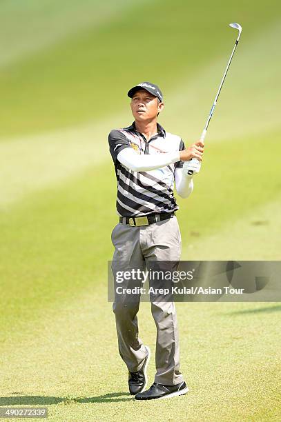 Chawalit Plaphol of Thailand plays a shot during practice ahead of the ICTSI Philippine Open at Wack Wack Golf and Country Club on May 14, 2014 in...