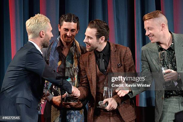 Singer-songwriters Adam Levine of Maroon 5, Jeff Bhasker, Ryan Lewis and Macklemore accept the 2014 BMI Songwriter of the Year Awards onstage at the...