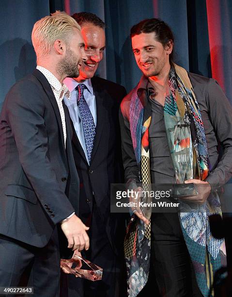 Singer-songwriter Adam Levine of Maroon 5 and producer/songwriter Jeff Bhasker accept the 2014 BMI Songwriter of the Year Award from Michael O'Neill,...