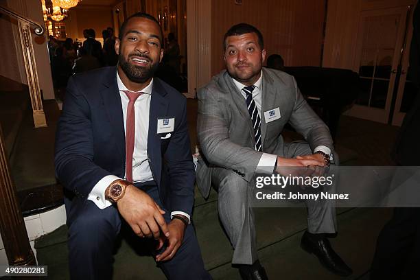 Spencer Paysinger and Henry Hynoski attend the 21st Annual Gridiron gala at The Waldorf=Astoria on May 13, 2014 in New York City.