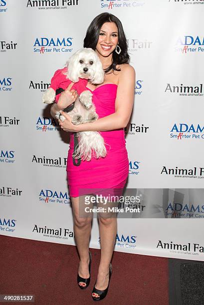 News Anchor Diana Falzone with dog Baily attend the 12th Annual Animalfair.com Paws For Style Fashion Show at Pacha on May 13, 2014 in New York City.