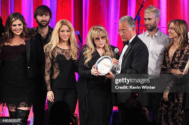 Singers Hillary Scott, Dave Haywood, Shakira, Del Bryant, BMI President, singers Adam Levine of Maroon 5 and Sheryl Crow present the 2014 BMI Icon...