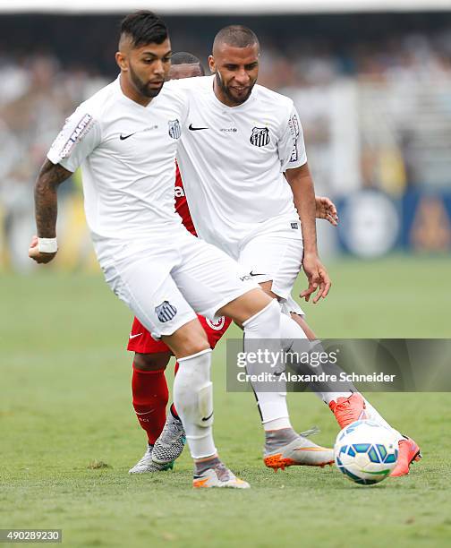 Gabriel and Nilson of Santos in action during the match between Santos and Internacional for the Brazilian Series A 2015 at Vila Belmiro stadium on...