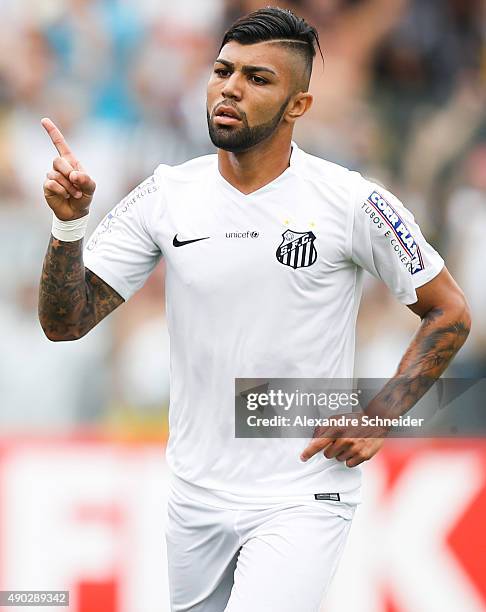 Gabriel of Santos celebrates their second goal during the match between Santos and Internacional for the Brazilian Series A 2015 at Vila Belmiro...