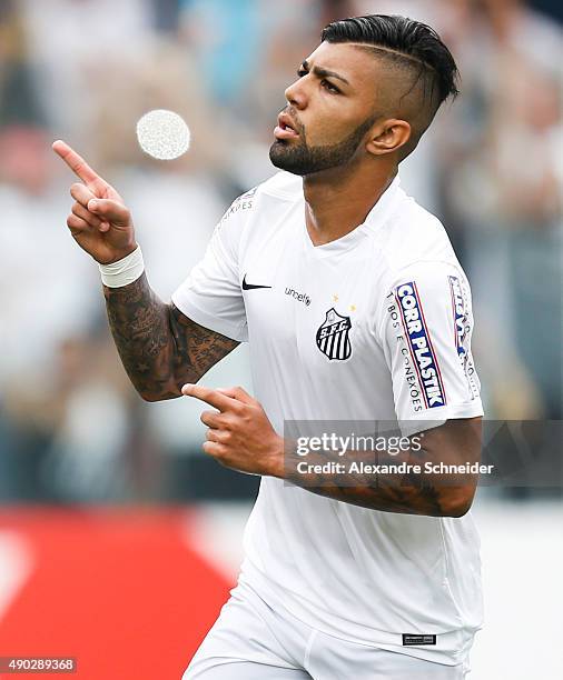 Gabriel of Santos celebrates their second goal during the match between Santos and Internacional for the Brazilian Series A 2015 at Vila Belmiro...