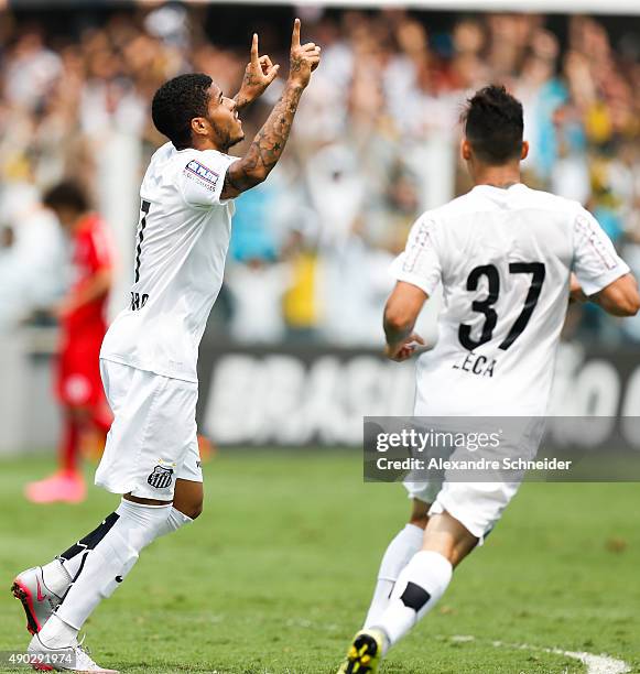 Leandro of Santos celebrates their thirth goal with his teammates during the match between Santos and Internacional for the Brazilian Series A 2015...