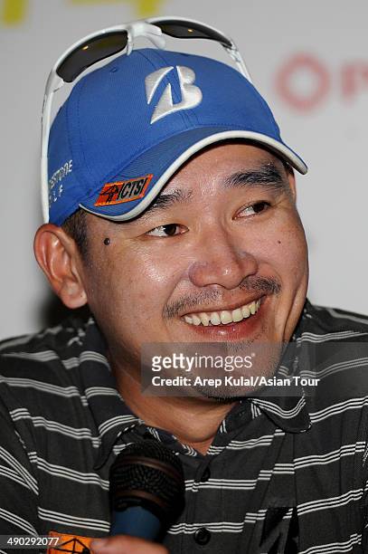Angelo Que of Philippines smiles during the press conference ahead of the ICTSI Philippine Open at Wack Wack Golf and Country Club on May 14, 2014 in...