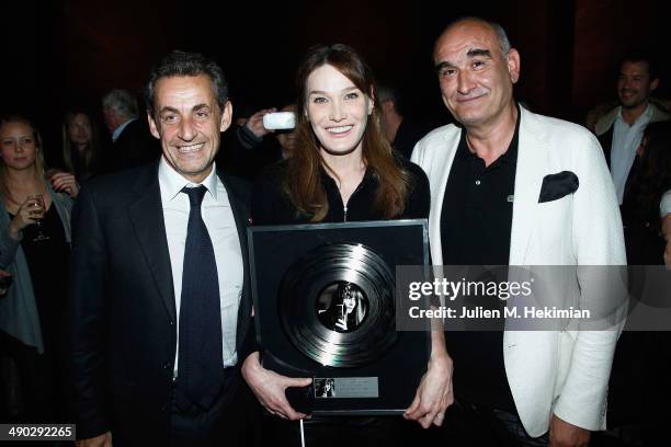 Italian singer and former First Lady of France Carla Bruni-Sarkozy is pictured with her husband, former French President Nicolas Sarkozy and...