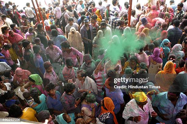 Devotees carry a statue of the Hindu God Ganesha to immerse in Yamuna River on the last day of the Ganesh Chaturthi festival at Ghaziabad on...