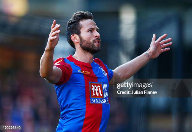 Yohan Cabaye of Crystal Palace celebrates as he scores their first goal from a penalty during the Barclays Premier League match between Watford and...