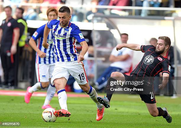 Vedad Ibisevic of Hertha BSC and Marc Stendera of Eintracht Frankfurt during the game between Eintracht Frankfurt and Hertha BSC on September 27,...
