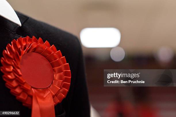 Young delegate wears a red rosette during the first day of the Labour Party Autumn Conference on September 27, 2015 in Brighton, England. The four...