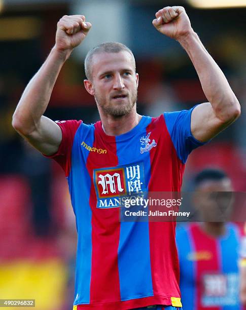 Brede Hangeland of Crystal Palace celebrate victory after the Barclays Premier League match between Watford and Crystal Palace at Vicarage Road on...