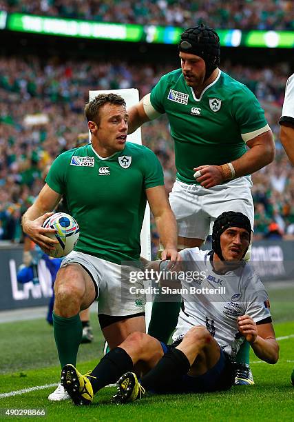 Tommy Bowe of Ireland scores their fourth try during the 2015 Rugby World Cup Pool D match between Ireland and Romania at Wembley Stadium on...
