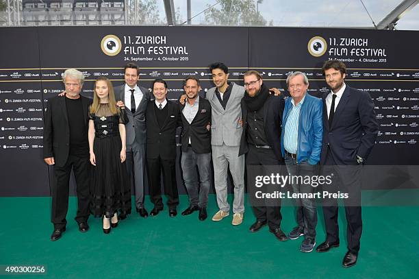 Tobias Queisser, Nicolas Steil, Martin Suter, Nora von Waldstaetten, Stephan Rick, Juergen Prochnow, Amir Hamz and Jan Krueger attend the 'Die Dunkle...