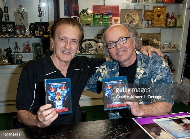 Director Eric Weston and actor Clint Howard sign copies of the BluRay "Evilspeak" held at Dark Delicacies Bookstore on May 13, 2014 in Burbank,...