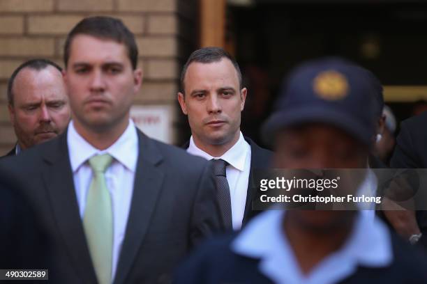 Oscar Pistorius leaves North Gauteng High Court after the judge ordered that he should undergo mental evaluation on May 14, 2014 in Pretoria, South...