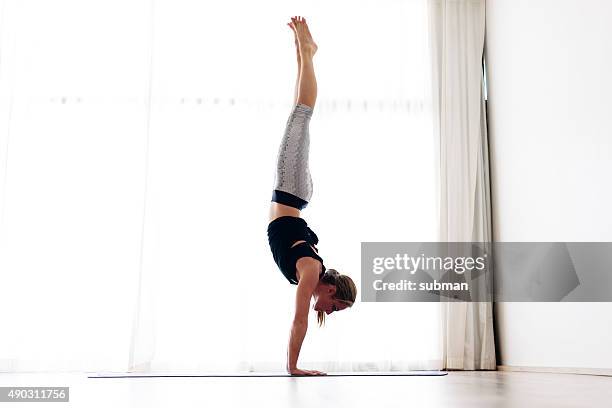 body mind spirit - handstand stock pictures, royalty-free photos & images