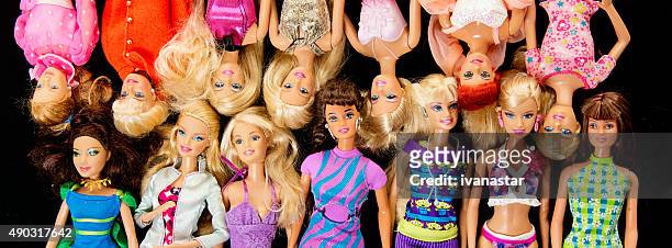 bunch of barbie fashon dolls banner - american girl doll stock pictures, royalty-free photos & images
