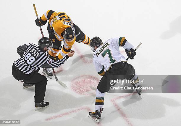 Matthew Tkachuk of the London Knights takes a faceoff against Juho Lammikko of the Kingston Frontenacs during an OHL game at Budweiser Gardens on...