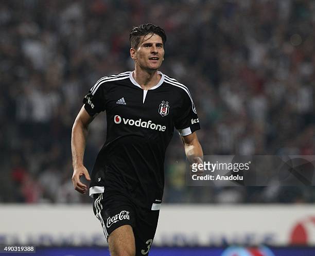 Mario Gomez of Besiktas celebrates after scoring a goal during the Turkish Spor Toto Super League match between Besiktas and Fenerbahce at Ataturk...