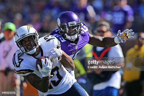 Keenan Allen of the San Diego Chargers pulls in a pass for a touchdown while Xavier Rhodes of the Minnesota Vikings applies pressure in the second...