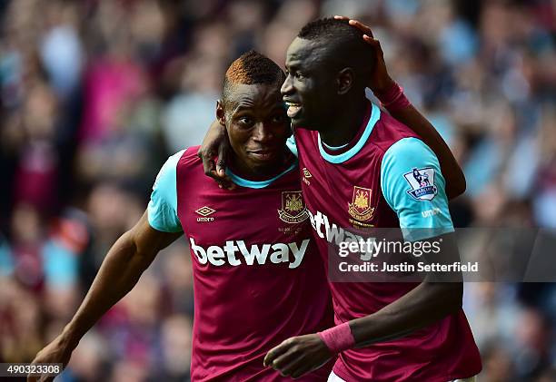 Cheikhou Kouyate of West Ham United and Diafra Sakho of West Ham United celebrate scoring his team's second goal during the Barclays Premier League...