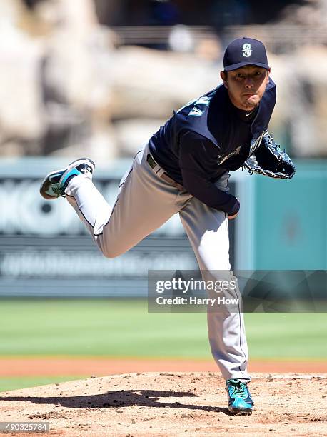 Hisashi Iwakuma of the Seattle Mariners pitches against the Los Angeles Angels during the first inning at Angel Stadium of Anaheim on September 27,...