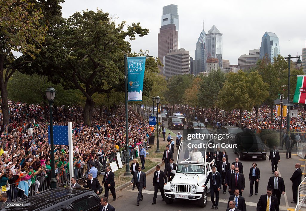Pope Francis Rides To Mass On Parkway In The Popemobile