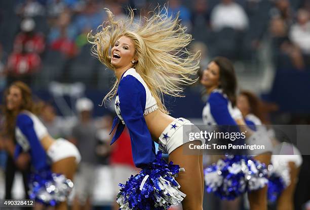 The Dallas Cowboys Cheerleaders perform as the Dallas Cowboys take on the Atlanta Falcons at AT&T Stadium on September 27, 2015 in Arlington, Texas.