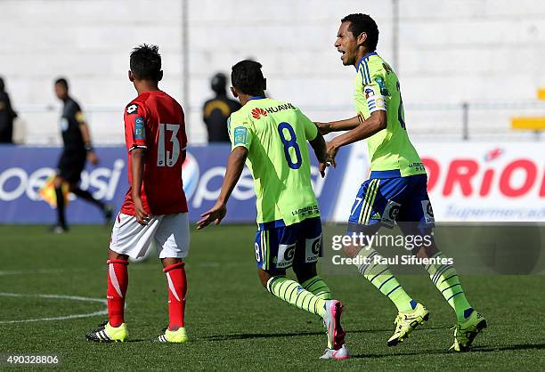 Carlos Lobaton of Sporting Cristal celebrates the second goal of his team against Cienciano during a match between Cienciano and Sporting Cristal as...