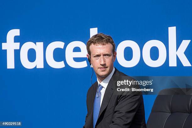 Mark Zuckerberg, chief executive officer of Facebook Inc., listens as Narendra Modi, India's prime minister, not pictured, speaks during a town hall...
