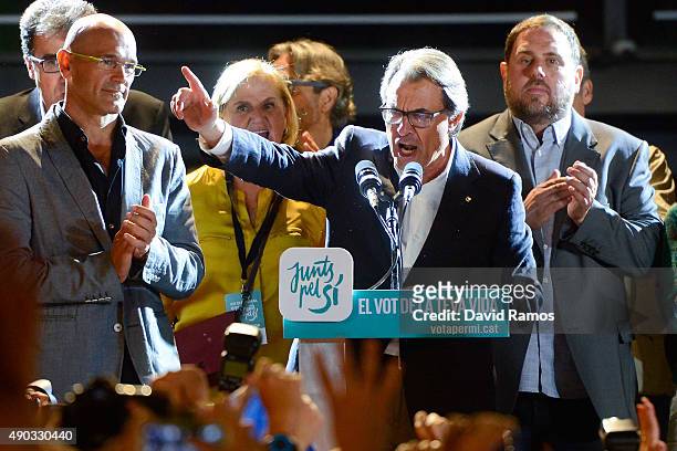 President of Catalonia Artur Mas celebrates as he speaks to wellwishers after the Catalanist coalition 'Junts pel Si' claimed victory in the regional...
