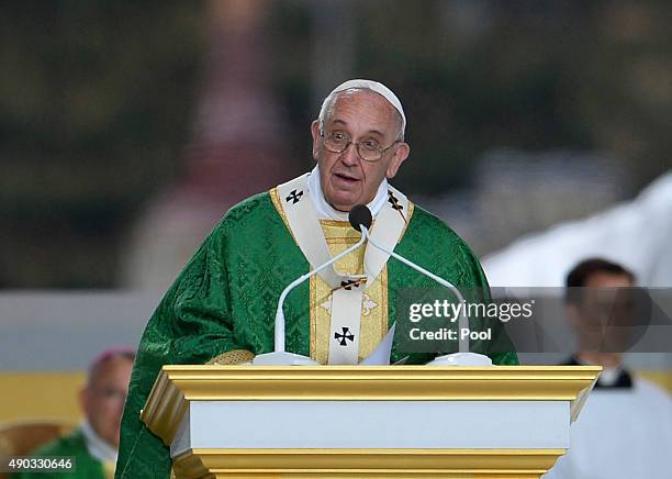 Pope Francis delivers the homily as he celebrates mass at the World Meeting of Families at Benjamin Franklin Parkway iSeptember 27, 2015 n...