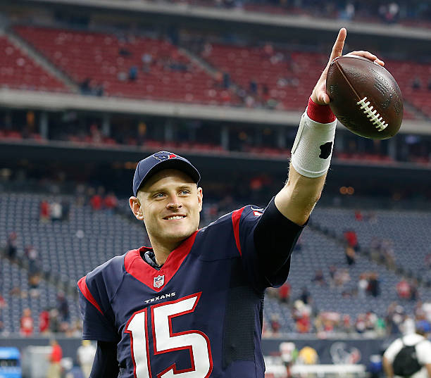 Ryan Mallett of the Houston Texans points to the crowd as he walks off the field afterf defeating the Tampa Bay Buccaneers 19-9 at NRG Stadium on...