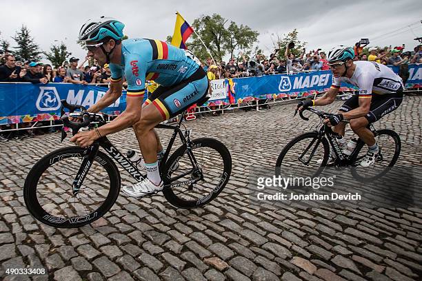 Nikolas Maes riding for the Belgian National Team leads Tony Martin riding for the German National Team up the base of the Libby Hill climb during...