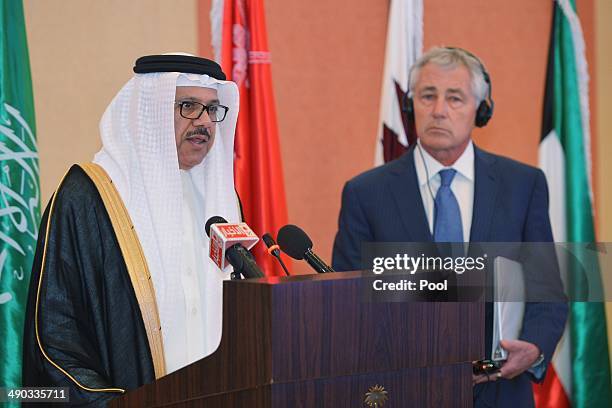 Gulf Cooperation Council Secretary General Abdullatif bin Rashid Al-Zayani speaks as US Defense Secretary Chuck Hagel listens during a presser as...